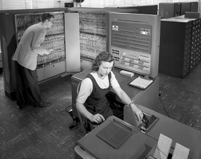 IBM type 704 electronic data processing machine used for making computations for aeronautical research. © NASA