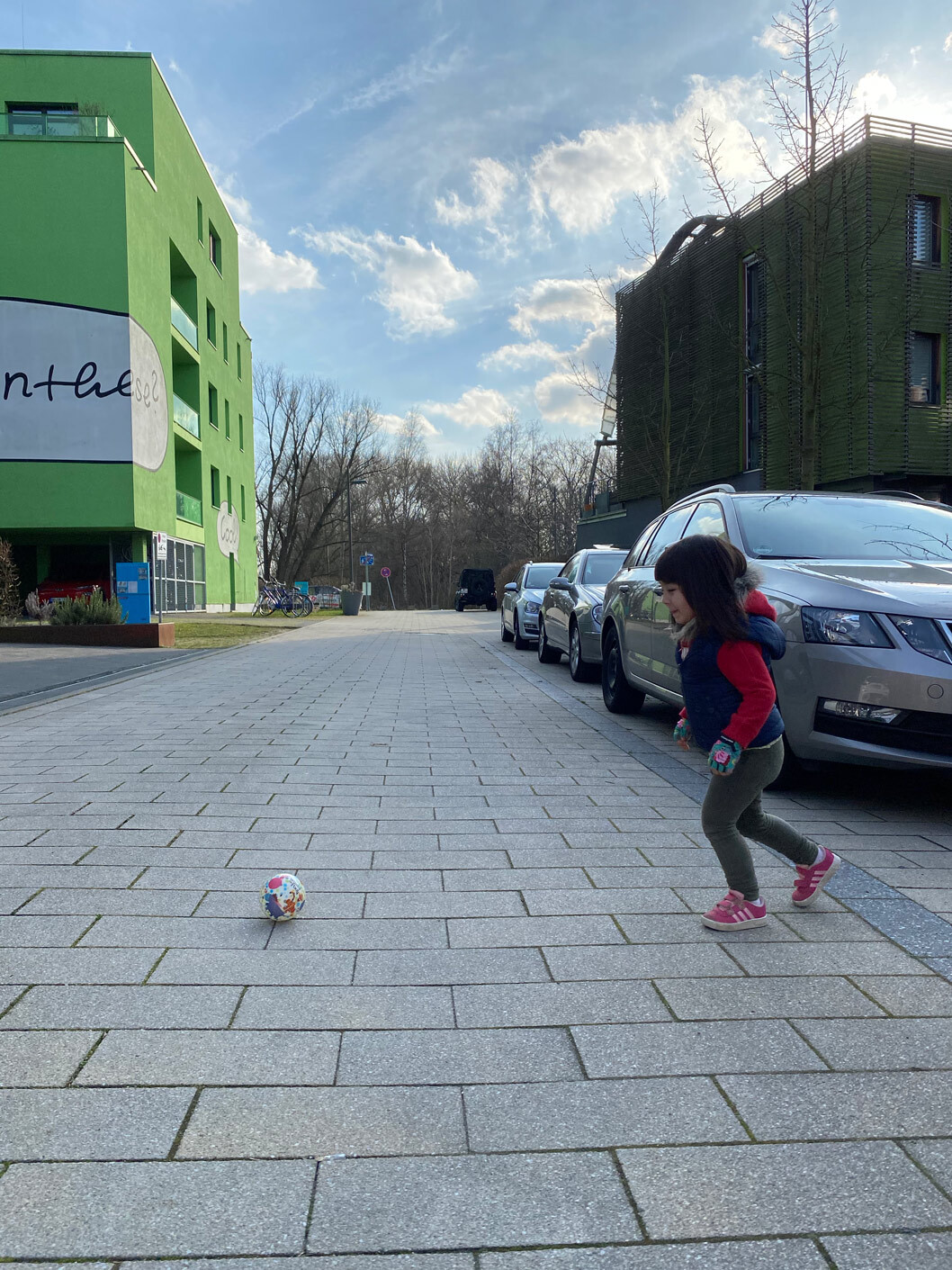 Child running after a ball